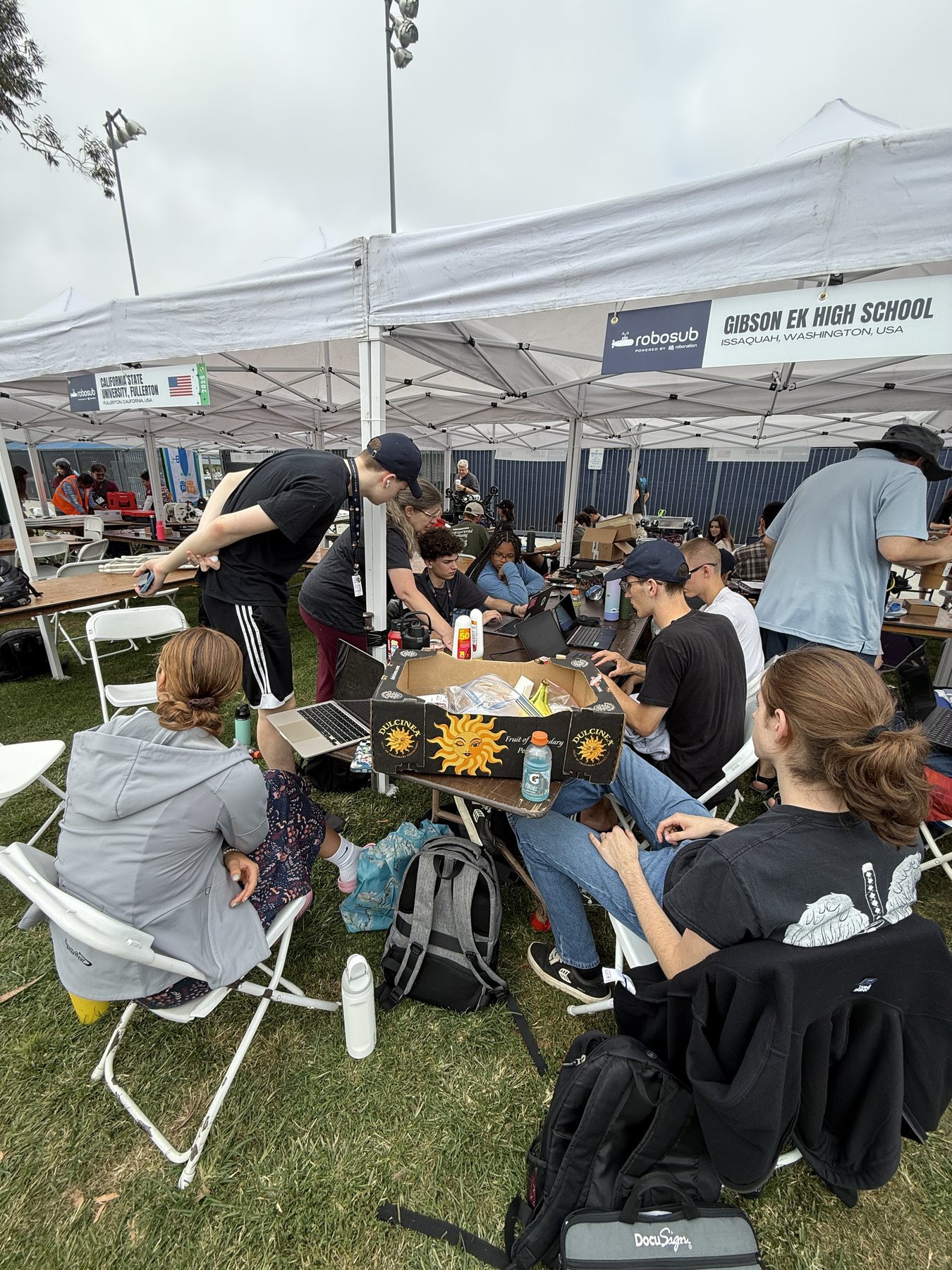 Circuit Trees team working in the RoboSub pit tent